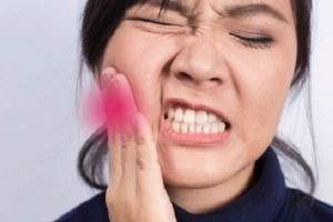 Đau nhức sau nhổ răng khôn hàm dưới có sao không?