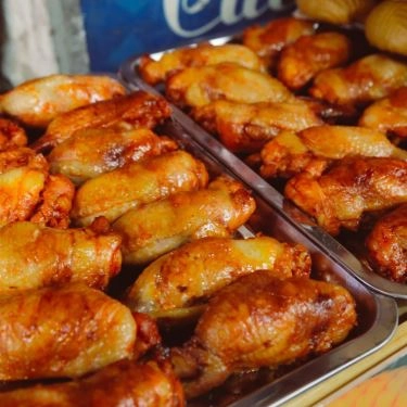 Món ăn- Quán Ăn HuynA Food - Cánh Gà Rút Xương Bọc Xôi