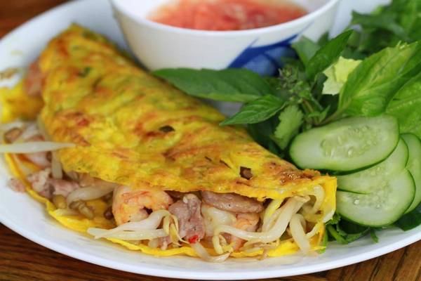 Món bánh xèo hải sản thơm ngon. Ảnh: longphutourist Món bánh xèo hải sản thơm ngon. Ảnh: longphutourist