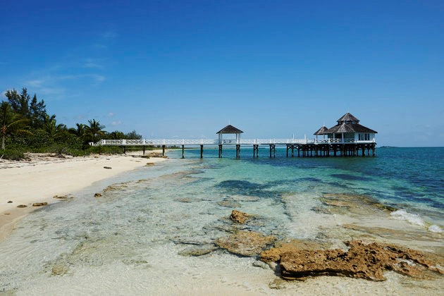 Kamalame Cay, Andros Island, Bahamas: Những khách sạn nhỏ xinh, vẻ đẹp nguyên sơ gần như chưa bị bất kỳ ngành công nghiệp nào chạm tới, ngoài trồng trọt và đánh bắt cá. Nhịp sống ở đây rất tĩnh tại và bình yên.