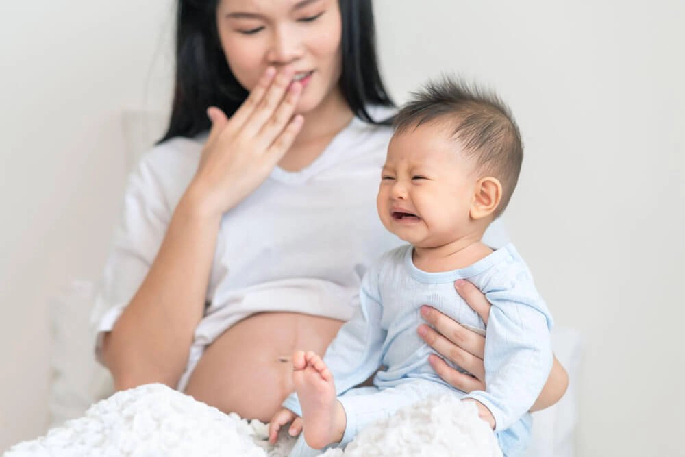dấu hiệu mang thai đang cho con bú