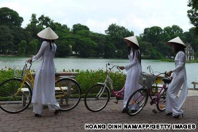 Young girls wearing traditional conical