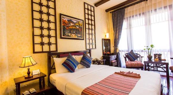 Phòng nghỉ  được trang trí tinh tế, làm nổi bật văn hóa địa phương.