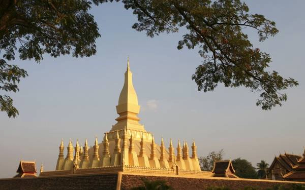 Pha That Luang là niềm tự hào lớn đối với người dân “đất nước Triệu voi”. Ảnh: Roughguides Pha That Luang là niềm tự hào lớn đối với người dân “đất nước Triệu voi”. Ảnh: Roughguides