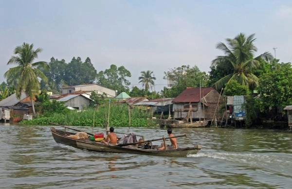 Thuyền ghe là phương tiện đi lại rất phổ biến của người dân Đồng Tháp. Ảnh: Tom Green/flickr.com