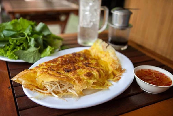 Bánh xèo tuy khá phổ biến ở miền Nam, nhưng mỗi vùng miền đều có những cách biến tấu khác nhau - Ảnh: Lonely Planet