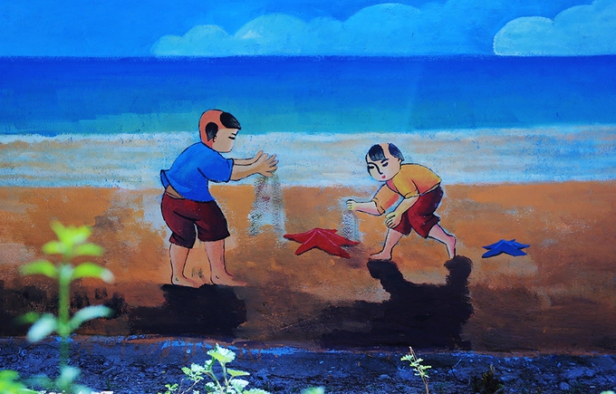 Một bức tranh miêu tả trò chơi của trẻ em vùng biển. Một bức tranh miêu tả trò chơi của trẻ em vùng biển.