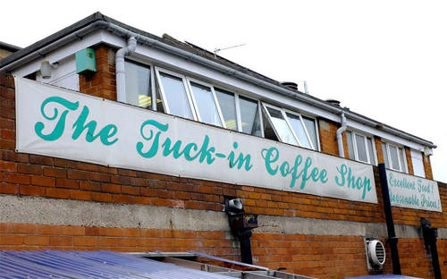 Tên cửa hiệu 'The Tuck-in'... Tên cửa hiệu 'The Tuck-in'...