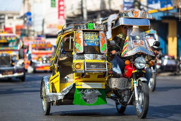 Tricycle là loại xe khá phổ biến tại các thành phố và khu du lịch ở Philippines. Ảnh: jjwrightfineart.com Tricycle là loại xe khá phổ biến tại các thành phố và khu du lịch ở Philippines. Ảnh: jjwrightfineart.com