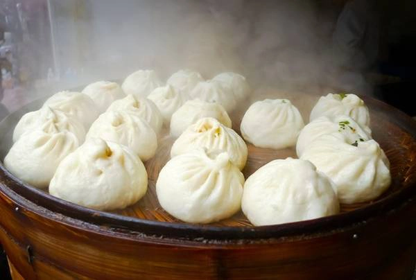 Bánh bao Tây An, Trung Quốc: Bạn có thể mua được 10 chiếc bánh bao mềm mại cùng nhân thịt đậm đà này với 1,5 USD. Ảnh: Banyangloballearning/Wordpress. Bánh bao Tây An, Trung Quốc: Bạn có thể mua được 10 chiếc bánh bao mềm mại cùng nhân thịt đậm đà này với 1,5 USD. Ảnh: Banyangloballearning/Wordpress.