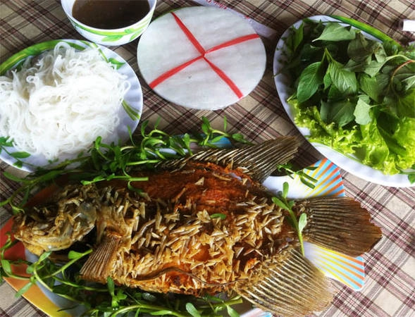 Cá tai tượng chiên xù góp mặt trong bàn nhậu của dân Vĩnh Long. Ảnh: tapchigiadinh.com.vn Cá tai tượng chiên xù góp mặt trong bàn nhậu của dân Vĩnh Long. Ảnh: tapchigiadinh.com.vn