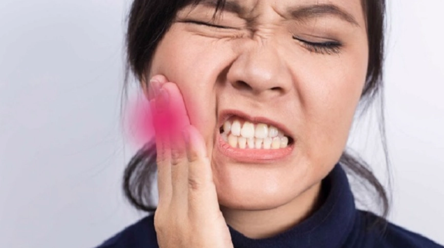 Đau nhức sau nhổ răng khôn hàm dưới có sao không?